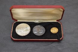 A 1972 Malta three coin proof set, comprising a £M5 22ct gold coin, 3g, and a £M2 20g and £M1 10g