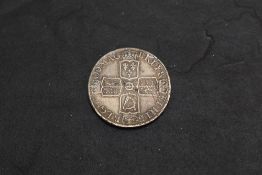 A 1709 Queen Anne Silver Half Crown, OCTAVO on edge, 15g