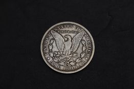 A United States Of America 1892 silver Morgan Dollar, 13 Stars, O Mint Mark for New Orleans