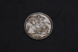 A 1899 Queen Victoria Silver Crown, Veiled Head, George & Dragon, dents to edge, obverse and reverse