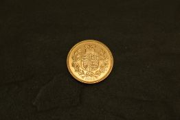 A 2002 Queen Elizabeth II Gold Sovereign, Shield of Arms, Royal Mint