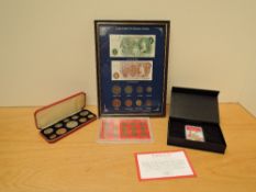 A GB Pre-decimal currency glazed and framed One Pound and 10 Shilling Notes with a 1948 Farthing
