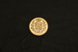 A 2002 Queen Elizabeth II Gold Sovereign, Shield of Arms, Royal Mint