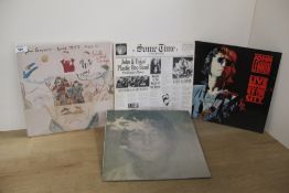 A lot of John Lennon and Yoko records - twelve in total