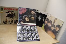 A Beatles vinyl lot - five in total - VG generally , as always we recommend viewing in person