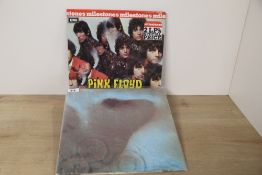 A Pink Floyd lot with Meddle and a nice pair with compiles with first two Syd Barrett era recordings