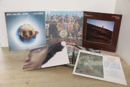 A lot of twelve albums - a random selection with Beatles , Miles Davis and more - all VG+ or better
