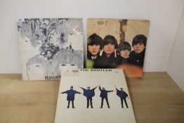 A Beatles lot - three in total VG only - classic titles - viewing recommended