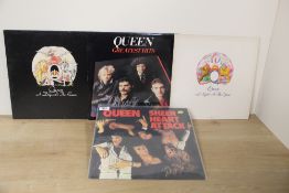 A lot of six UK Queen records with some UK originals here - all VG or better - please feel free to