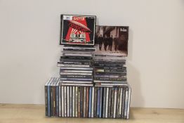 A Compact Disc collection - around fifty titles with rock , pop , country and more