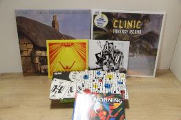 A lot of albums by Liverpool indie / psych band Clinic , also come with 45's and a triple album