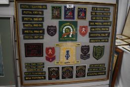 A framed and glazed Shooting Patches display, 1977-1988 including Leicestershire & Rutland Rifle