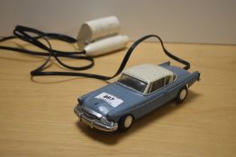 A AMT Inc Birmingham, Mich, tin plate and plastic Studebaker Commander Remote Control Car, blue