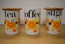 Three Crown Devon retro storage caddies two having wooden lids, lids missing seals.