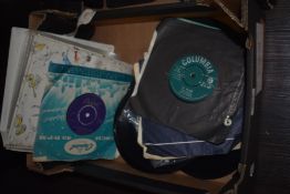 An assortment of 7'' singles comprising titles 'Almost There' and 'The Old Rocking Chair' etc.