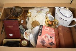 A set of Viewmaster stereoscope viewers and a Viewmaster Album containing a selection of slides, a