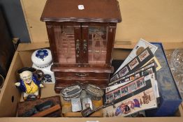 A miscellaneous selection of items including a large wooden cabinet style jewellery box, a