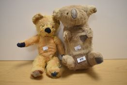 A Chad Valley yellow plush straw filled Teddy Bear having plastic eyes, stitched nose and mouth,