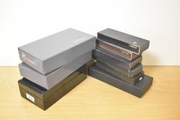 Nine various Parker pen cases.