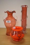 A Royal Scott cranberry glass vase, a tall slender Victorian cranberry glass vase (AF) and a