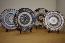 A Compton & Woodhouse Limited Edition 1000/2000 set of four Millennium Plate collection, each