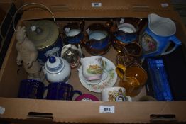 A dark blue Jasperware biscuit jar, three graduated lustreware jugs, a boxed MS Saga Ruby Farewell