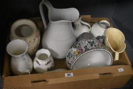 A collection of assorted jugs and vases including a large Wedgwood 'April Flowers' vase, a Royal
