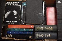 A selection of reading material, to include 'Astronomy for GCSE', 'Spycatcher', and 'Strange World