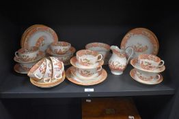 A selection of Victorian hand painted teaware, the design featuring Chinese landscapes with pagodas,