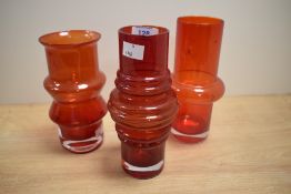 A Riihimaki red glass vase in the Tulppaani design, measuring 20cm high, and two other Finnish Art