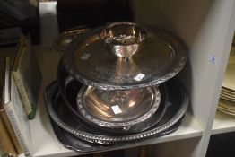 An assorted collection of engraved silver plated ware, to include galleried drink's trays, and a