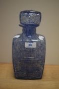A Scandinavian moulded art glass decanter with stopper, possibly by Bjorkshults and of Cubist