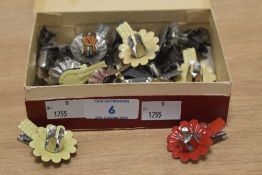 A box of enamelled Christmas tree candle clips
