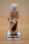 A Shafer & Vater novelty smoker head singer ashtray, measuring 12cm high