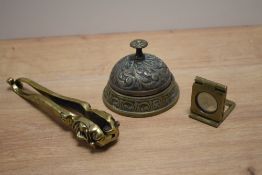 A pair of novelty brass Court Jester nutcrackers, measuring 18cm long, together with an embossed
