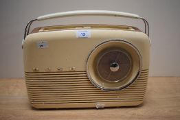 A Bush cream coloured bakelite radio, Receiver Type TR 82 DL, measuring 33cm long