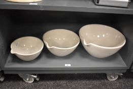 Three John Julian Design ceramic evaporating bowls of graduating sizes, the largest with a