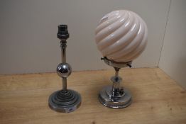 An Art Deco chromed table lamp with pink swirl glass shade, measuring 28cm high, and a separate