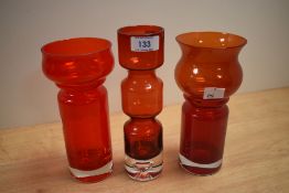 A 1970s Swedish red glass vase by Bo Borgstrom for Aseda, of hooped form and measuring 22cm high,