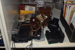 A vintage Hanimex 35SE compact camera, together with an assorted collection of other plastic