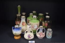 A hand painted porcelain bud vase, decorated with a scene illustrating cattle watering, having a