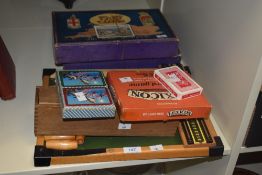 A Kay of London table top skittles game, a box of dominoes, two Chad Valley jigsaw puzzles, and card