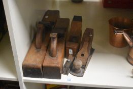 Five vintage wood plains in various sizes.