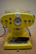 A retro Francis Francis XI Magic L'Espresso coffee machine in yellow with filter
