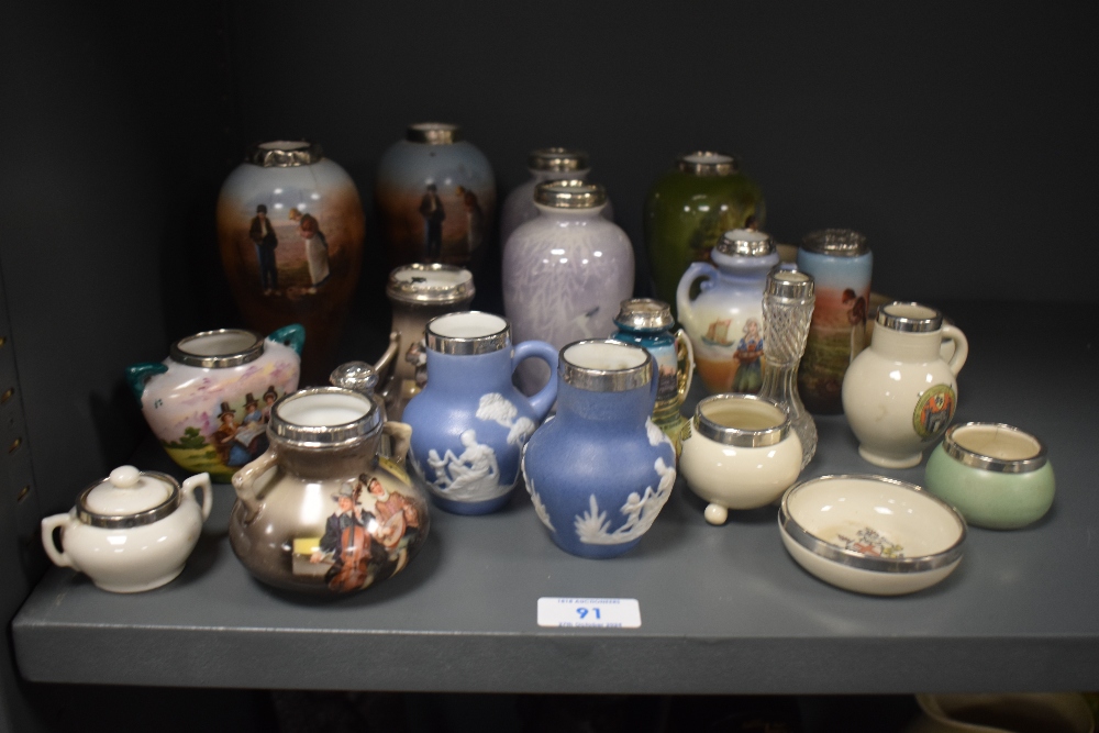 A selection of miniature silver mounted ceramics, to include vases and trinket dishes