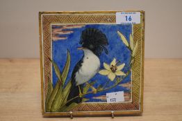 An attractive art tile designed by W.B. Simpson & Sons, illustrated with an exotic crested bird