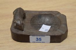 A Robert Thompson of Kilburn Mouseman carved oak ashtray, measuring 10cm long