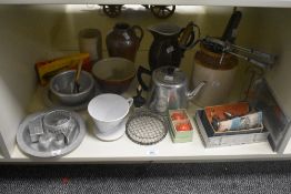 A selection of kictehnalia items comprising a salt glazed stoneware pot, salt and pepper shakers
