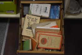 A selection of books and maps, including 'Let's Go For a Walk, Round About Keswick' and an