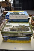 Eight Italeri 1:35 scale plastic kits, Sherman M4 A1 Tank, Paladin SP Howitzer, LVT 4 Water Buffalo,